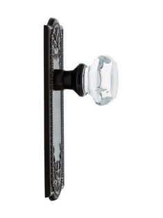 an image of a door handle with glass knobs on the front and back of it