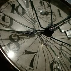 a close up of a clock face with numbers and times on the inside of it