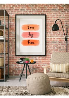 a living room filled with furniture and a brick wall