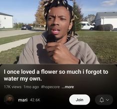 a man with dreadlocks on his head is looking at the camera and has an instagram