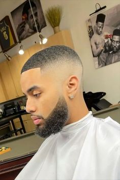 Mid Fade Haircut: 30 Styles for the Urbane Man Haircut Fade Men Black, Short Fade Haircut Men Black, Mid Fade With Beard, Curly Fade Haircut Men Black, Mid Fade Haircut Men Black, Bald Fade Haircut Men Black, Mid Fade Black Men, Fade Haircut Men's Black, Black Men Fade Haircut