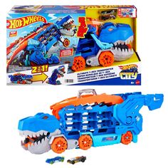 a blue and orange toy truck with a shark on it