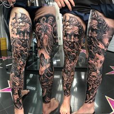 the legs are covered in black and grey tattoo art, with an angel on it