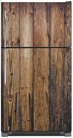 an old wooden refrigerator with metal handles