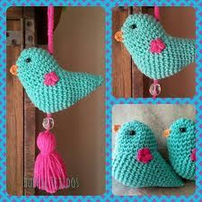 crocheted bird ornament with tassels and beads