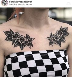 a woman wearing a checkered dress with flowers on her chest and shoulder tattoo design