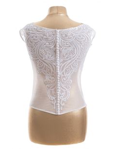 White Wedding bolero, Ivory lace bolero, Bridal jacket, Sleeveless bridal lace wedding bolero, Wedding jacket, Bolero for wedding dress 050 You will receive such a bolero as in the photo. Choose color: ivory (creme) or white See the lace fabric for the wedding dress: 3D lace : www.etsy.com/shop/KingdomLace?ref=seller-platform-mcnav&section_id=23652665 Chantilly lace www.etsy.com/shop/KingdomLace?ref=seller-platform-mcnav&section_id=23652699 Wedding lace www.etsy.com/shop/KingdomLace?ref= Wedding Corset With Delicate Lace, Elegant Lace Wedding Corset, Elegant Lace Wedding Night Corset, Elegant Lace Corset For Wedding Night, Fitted Lace Corset For Wedding Night, Elegant White Lace Bodice, Elegant Sleeveless Bodice With Lace Trim, Wedding Corset With Lace Bodice, Wedding Lace Corset