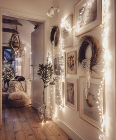 the hallway is decorated with lights and pictures