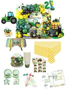 a table topped with lots of green and yellow decorations next to a tractor themed cake