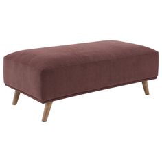 the footstool is made from wood and has a dark purple fabric on it