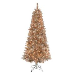 a small white christmas tree with lights on it's top and bottom branches in front of a white background