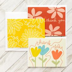 three cards with thank you written on them, one has flowers and the other has leaves