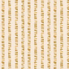 a white and gold striped wallpaper with small brown dots on it's sides