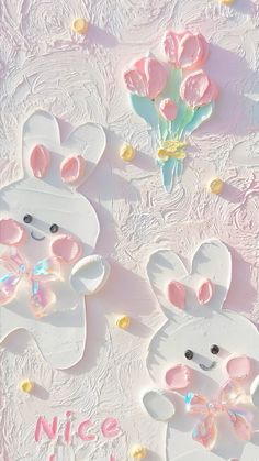 two white rabbits with pink bows on their ears and one bunny holding a flower in its mouth