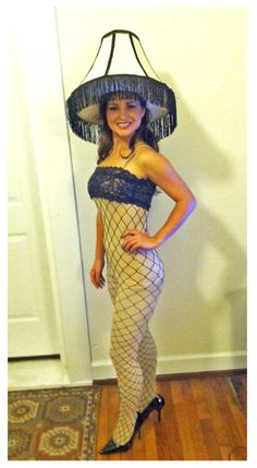 a woman wearing fishnet stockings and a hat with fringes on it's head