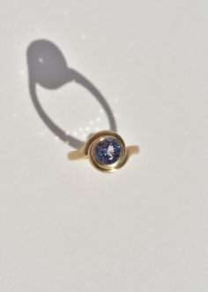 Timeless, and an intentional reference to time, this 14k yellow gold Infinite Ring wraps around a beautiful periwinkle fairmined Australian Sapphire. While this piece is one-of-a-kind, this solitaire style is available to be customized with other round or oval stones, in faceted or cabochon cuts. Details: Comprised of solid 14k gold. 1.89 Ct Australian sapphire. Gold is 100% recycled. Soft Satin Finish at exterior of ring. Engraved with maker's mark and fineness mark at interior. Ring is a size Infinite Ring, Ring Wraps, Australian Sapphire, Oval Stone, Maker's Mark, Wrap Rings, Fashion Help, Satin Finish, Sapphire