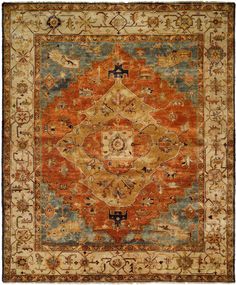 an orange and blue area rug with many different designs on the border, in various colors