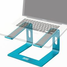 an open laptop computer sitting on top of a blue stand