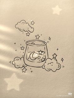 a drawing of a jar with stars and moon on it