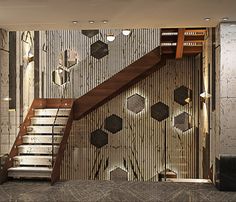 the stairs are made of wood and have been decorated with metal hexagonal tiles