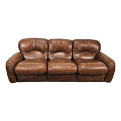 a brown leather couch with two reclinings on the back and one arm extended