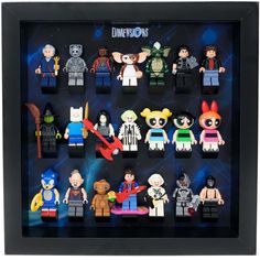 the lego movie characters are displayed in a shadow box