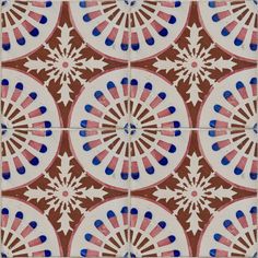 an artistic tile design in red, white and blue with circular designs on the tiles