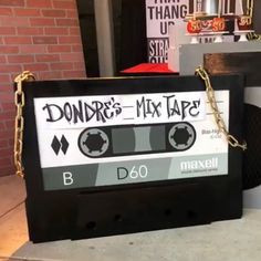 a black and white sign that says don't mix tape on it with chains