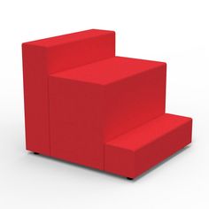 a red chair sitting on top of a white floor