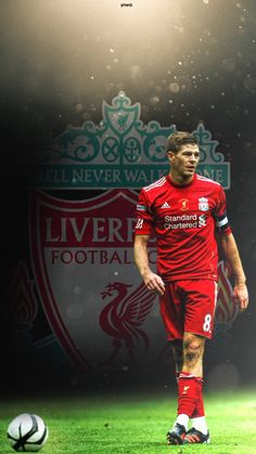 a soccer player is standing in front of the liverpool wallpaper with his name on it