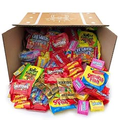 a cardboard box filled with assorted candy