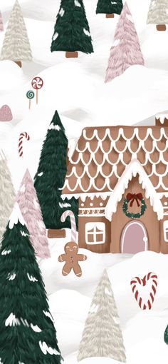 a gingerbread house surrounded by trees and candy canes on a snow covered hill