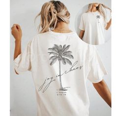 White Oversized Tee Crewneck Short Sleeve Printed Palm Tree Stretchy 95% Polyester, 5% Elastane Shop Our Boutique For Styles/Events: Romantic Date Night Bride Lingerie Winter Fall Summer Spring Boho Hippie Beachy Bohemian Girly Trendy Minimalist Y2k College 90s 00s 70s Vintage Wedding Guest Engagement Party Bachelorette Vacation Cruise Travel Western Aesthetic Vibe Retro Christmas Thanksgiving Holiday Chic Casual Dressy Preppy Tiktok Classic Classy Work Office Business Contemporary Professional Things To Put On Shirts, Cute Christian Shirts, Australia Shopping, Outfits For School Summer, Bride Lingerie, Beach Casual, Mesh Long Sleeve, Oversized Tee, Casual Girl