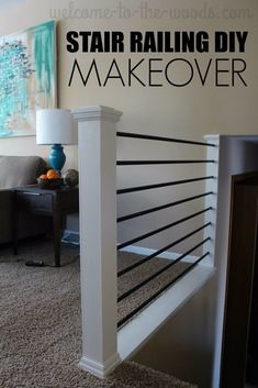 a living room with a couch, chair and stair rail