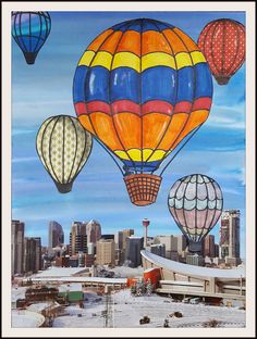 hot air balloons in the sky over a cityscape with buildings and snow on the ground