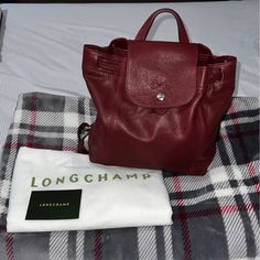 Longchamp Lepliage Backpack Color: Red Laquer Buttery Leather Adjustable Straps Interior Pocket Used Once No Flaws Perfect For Every Day Use Comes With Dustbag Red Leather Backpack, Longchamp Red, Longchamp Bags, Leather Backpack, Red Leather, Every Day, Dust Bag, Adjustable Straps, Bag Lady