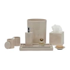 a bathroom accessory set with soap dispenser, toothbrush holder and tissue dispenser