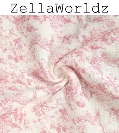 a pink and white blanket with the words zellaworlddz written on it