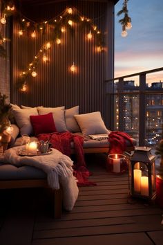 a balcony decorated for christmas with lights and candles