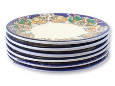 a stack of blue and white plates sitting on top of each other