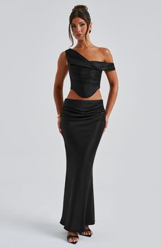 Oh she's luxury! Guaranteed to make you centre of attention, the Bernadette maxi crafted in our premium stretch satin, cut on the bias for a beautiful drape. This one-of-a-kind piece has a pleat detail to the front and diagonal seam at the knee. Pair with the Audra top for a dreamy, luxe look. 



Colour: Black.

Luxury stretch satin fabric.

Fully lined.

Cut on the bias for a beautiful drape.

Pleat detail to front.

Diagonal seam at knee.

Invisible zipper fastening. Maxi length.

 Size: XS, Stretch Satin Fabric, Split Long Dress, Loungewear Dresses, Maxi Dress Sale, Black Luxury, Maxi Dress Navy, Jumpsuit Shorts Rompers, Stretch Satin, Formal Party