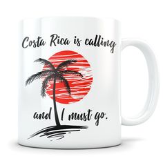 a white coffee mug with a palm tree and the words, coconut is calling and i must go