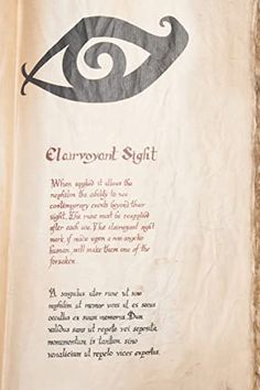 an old book with some type of eye on it's cover and the text underneath