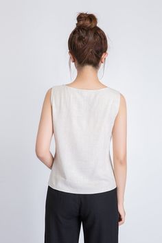 "It's called EveryWear because you can wear this linen tank top... well, everywhere. And we mean everywhere. At the office, happy hour, first dates, second dates, picnics, parties, BBQs, running errands, running 5Ks. You get the idea. DETAILS * 50% linen , 50% cotton blend * Scoop neckline * No zipper * Loose fit * Summer Tank top * Wash by hand or machine with cold water, Ironing after dry * Size Guide https://www.etsy.com/listing/722950722 * SIZE CHART https://www.etsy.com/listing/736810337 * Beige Linen Sleeveless Blouse, Beige Sleeveless Linen Top, Beige Ramie Summer Top, Beige Ramie Top For Summer, Summer Beige Ramie Tops, Beige Linen Tank Top For Summer, Sleeveless Flax Summer Tops, Long Linen Pants, Long Wool Skirt