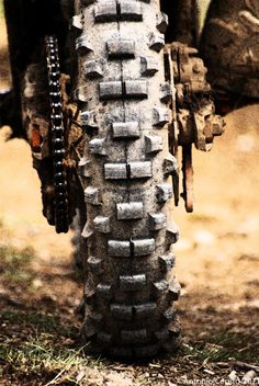 the rear tire of an old motorcycle