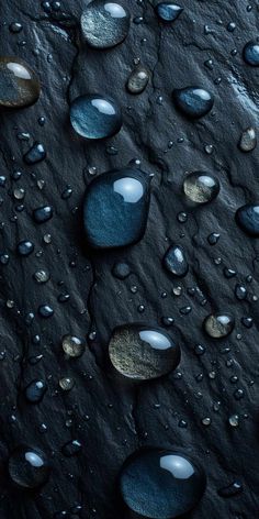 drops of water on the surface of rocks