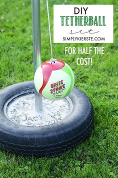 a golf ball on top of a tire in the grass with a sign that says, diy tetherball for half the cost