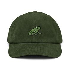 This Frog Hat features an adorable design that's sure to make you smile. The cute frog face is embroidered onto the front of the hat, complete with big eyes and a friendly smile. It's the perfect way to add a touch of fun to any outfit, whether you're dressing up or just running errands. * 100% cotton corduroy * Soft, unstructured crown * Cotton twill sweatband and taping * Adjustable buckle 🌿 Eco-Friendly Production ✈️ Ships Internationally 🎁💝 Beautiful gift for Friends, Family and Loved one Dad Style, Embroidered Corduroy, Corduroy Hat, Mushroom Hat, Hat Handmade, Dad Cap, Embroidered Caps, Embroidered Baseball Caps, Corduroy Fabric