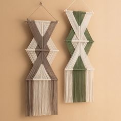 two wall hangings with different colors and designs