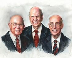 three older men in suits and ties are smiling for the camera, one is wearing a red tie